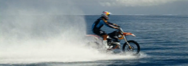 Motocross star surfs big waves on his bike